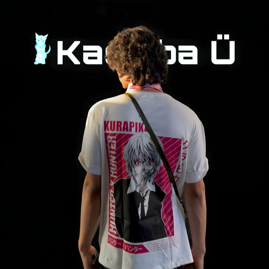 Back view of the model showcasing the premium oversized white t-shirt from Kashiba U with design inspired by Kurapika from the anime Hunter X Hunter. Shop trendy premium t-shirt from Kashiba U online. Buy Now!