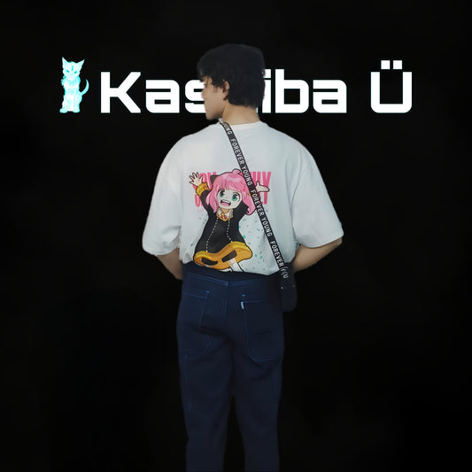 Back view of the model showcasing the premium oversized white t-shirt from Kashiba U with design inspired by Anya Forger from the anime Spy x Family. Shop trendy premium t-shirt from Kashiba U online. Buy Now!