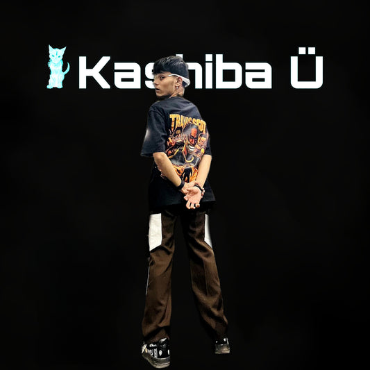 Back view of the model showcasing the premium oversized black t-shirt from Kashiba U with design inspired by Travis Scott. Shop trendy premium t-shirt from Kashiba U online. Buy Now!