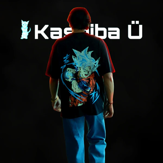 Back view of the model showcasing the premium oversized black t-shirt from Kashiba U with design inspired by Goku doing Kamehameha in Ultra Instinct Form from the anime Dragon Ball Z. Shop trendy premium t-shirt from Kashiba U online. Buy Now!