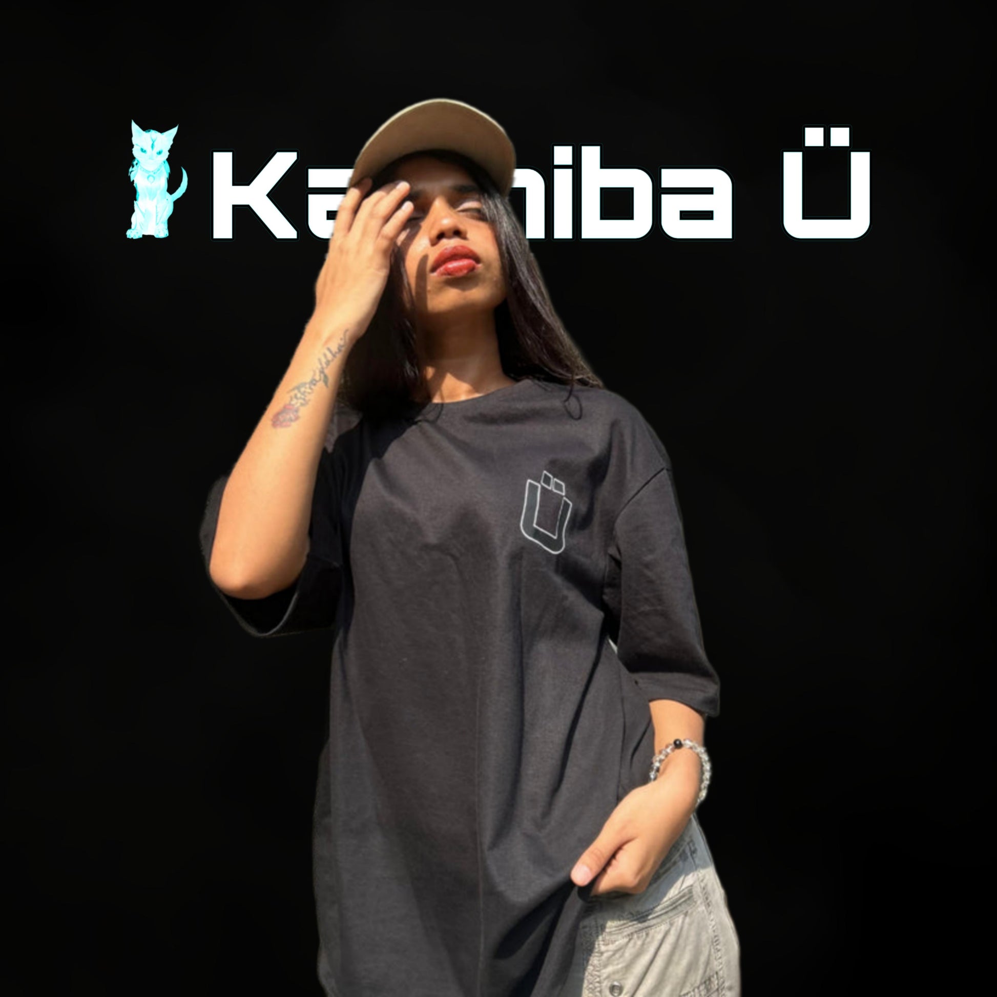 Front view of the model showcasing the premium oversized black t-shirt from Kashiba U. Shop online today.
Tag- Buy Now!