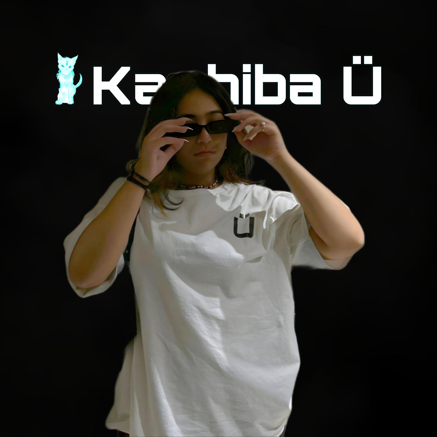 Front view of the model showcasing the premium oversized white t-shirt from Kashiba U. Shop online today.
Tag- Buy Now!