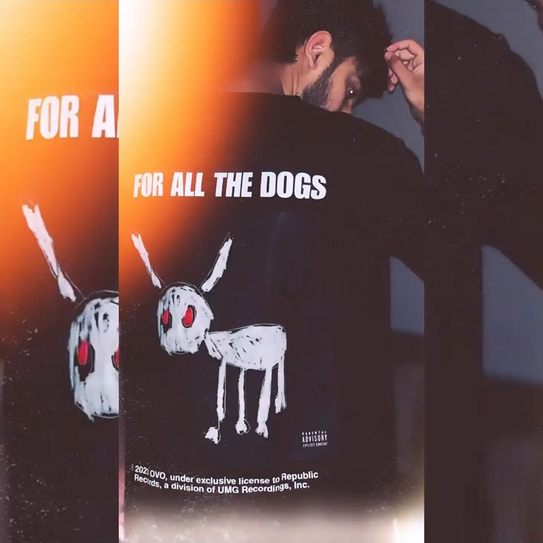 Back  view of the model showcasing the premium oversized black t-shirt from Kashiba U with design inspired by For All The Dogs from the Musician Drake Album Art. Shop trendy premium t-shirt from Kashiba U online. Buy Now!
