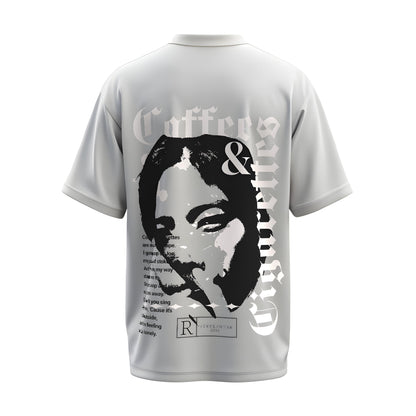 Back view of the premium oversized white t-shirt titled “Coffee and Cigarette” from Kashiba U with cool graphic design inspired by street art printed at the back of the t-shirt. Shop trendy streetwear graphic tee from the website of Kashiba U online. Buy Now!