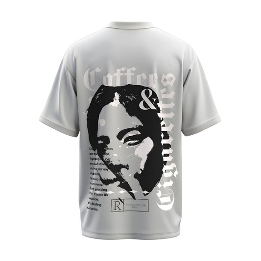 Back view of the premium oversized white t-shirt titled “Coffee and Cigarette” from Kashiba U with cool graphic design inspired by street art printed at the back of the t-shirt. Shop trendy streetwear graphic tee from the website of Kashiba U online. Buy Now!