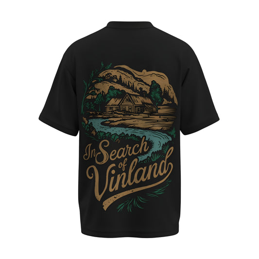 Back view of the premium oversized black t-shirt titled “In Search Of Vinland” from Kashiba U with cool graphic design inspired by street art printed at the back of the t-shirt. Shop trendy streetwear graphic tee from the website of Kashiba U online. Buy Now!
