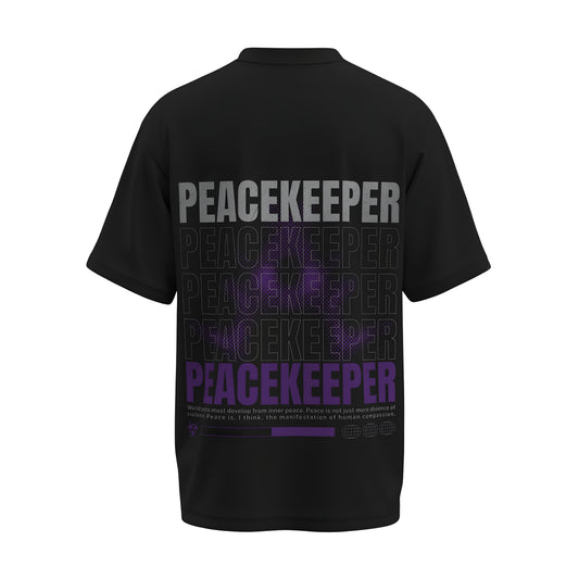 Back view of the premium oversized black t-shirt titled “Peacekeeper” from Kashiba U with cool graphic design inspired by street art printed at the back of the t-shirt. Shop trendy streetwear graphic tee from the website of Kashiba U online. Buy Now!