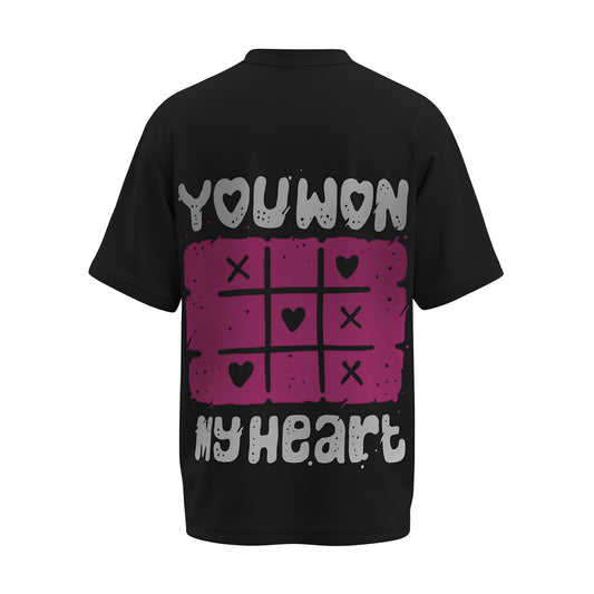 Back view of the premium oversized black t-shirt titled “You Won My Heart” from Kashiba U with cool graphic design inspired by street art printed at the back of the t-shirt. Shop trendy streetwear graphic tee from the website of Kashiba U online. Buy Now!